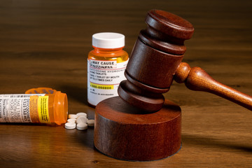 Oxycodone is the generic name for opoid pain killing tablets. Prescription bottle for pills and...