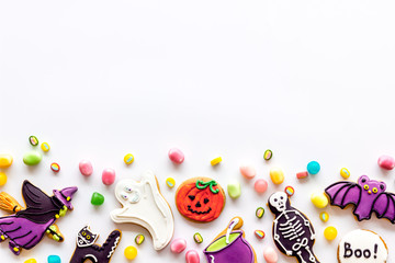 Fototapeta na wymiar Halloween decorations frame on white background top view copyspace