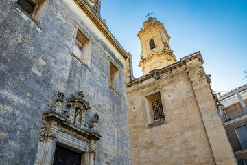 The mother church of Cavallino, Lecce, Puglia, Salento, Italy. In baroque style. The side entrance...