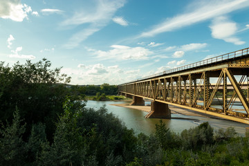 Railroad bridge over the South Saskatchewan River in Saskatoon Saskatchewan Canada