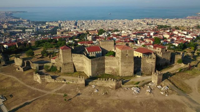 Aerial drone video of iconic byzantine Eptapyrgio or Yedi Kule medieval fortress overlooking city of Salonica or Thessaloniki, North Greece
