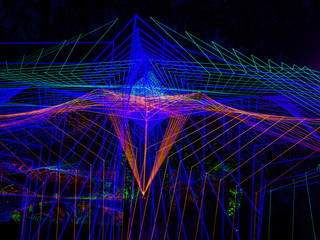 Stretched yarn glowing in ultraviolet light