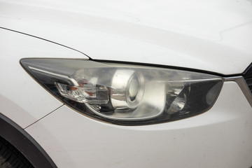 headlights of the car dim from working a long time,blurred headlights on the car,Damaged and...