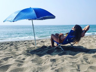 beach chair and umbrella on the beach