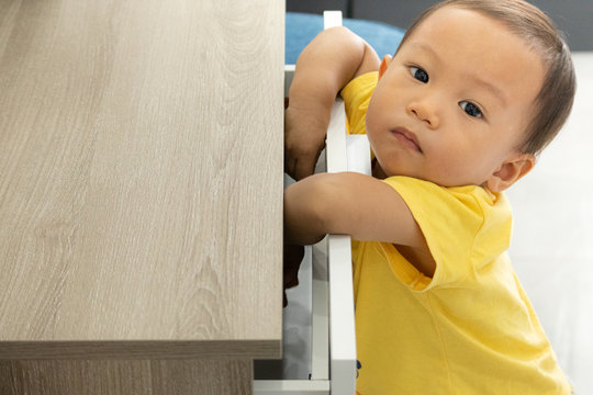 Baby Opening Drawer, Asian Boy Opening A Drawer,Children Explore The Open Drawer,