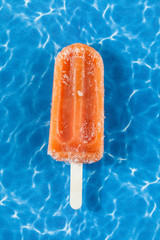tasty and refreshing Popsicle  with flavor tangerine.
