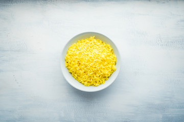 Indian Food: Yellow Rice Bowl on a White Background