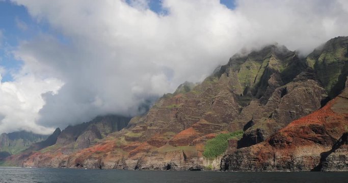 Hawaii beach, Kauai. Na pali coast view from water. Famous Hawaiian travel destination. Napali coastline in Kaui, Hawaii, USA, the Honopu arch.