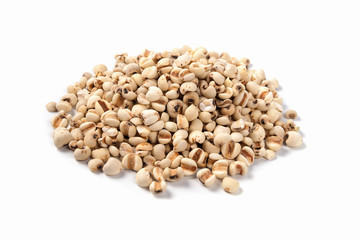 Organic millet grains on white background.