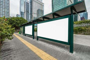 Blank billboard at bus stop in city of China.