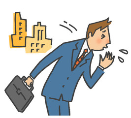 くしゃみをする会社員