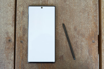  The New Samsung Galaxy Note 10 plus on wooden table