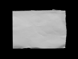 Ripped paper on black background, space for advertising copy.
