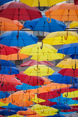 Fototapeta na wymiar Alley of soaring umbrellas in the sky St. Petersburg
