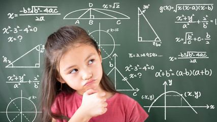 little girl thinking about mathematics problem - obrazy, fototapety, plakaty