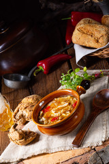 Spicy tripe soup with red paprika.