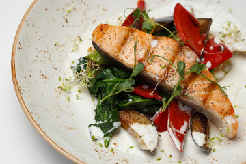 salmon steak with a japan salad and sauce