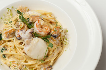 sea food pasta on white background