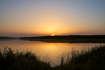 Beautiful morning landscape of shores of lake 
