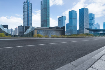 empty urban road with modern building in the city.