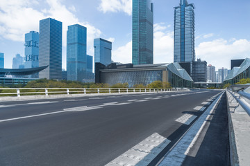 empty urban road with modern building in the city.