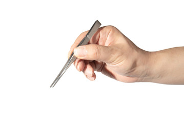 Close up of man's hand holding an tweezers
