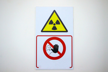Details with the international radiation symbol (also known as the trefoil) together with a keep...