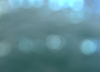 Blue bokeh background texture, calm abstract pattern.  