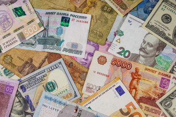 Multicurrency background of euros US dollars, Russian rubles, Egyptian pounds and Ukrainian hryvnias