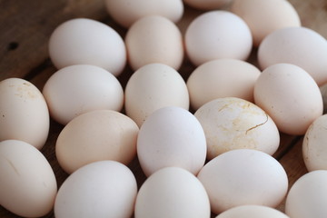 Fresh farm chicken eggs on the counter.