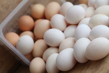 Fresh farm chicken eggs on the counter.