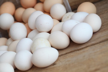 Fresh farm chicken eggs on the counter.