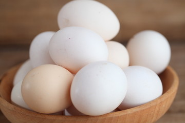 Fresh farm chicken eggs on the counter.