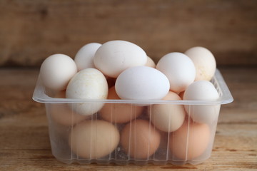 Fresh farm chicken eggs on the counter.