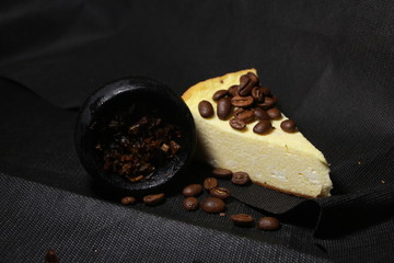 bowl with tobacco for hookah. berries on a black background