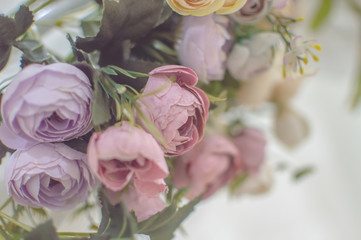 texture artificial roses on the wedding arch. decoration. background. selective focus