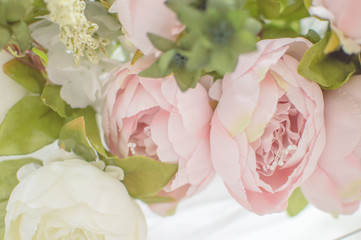texture artificial roses on the wedding arch. decoration. background. selective focus