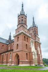 Fototapeta na wymiar View at the Church of Assumption of St. Mary in Rzepiennik Biskupi village - Poland