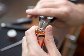 Vaping device maintenance and repairs in vape store