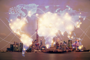 Double exposure of business theme hologram drawing and city veiw background. Concept of success.