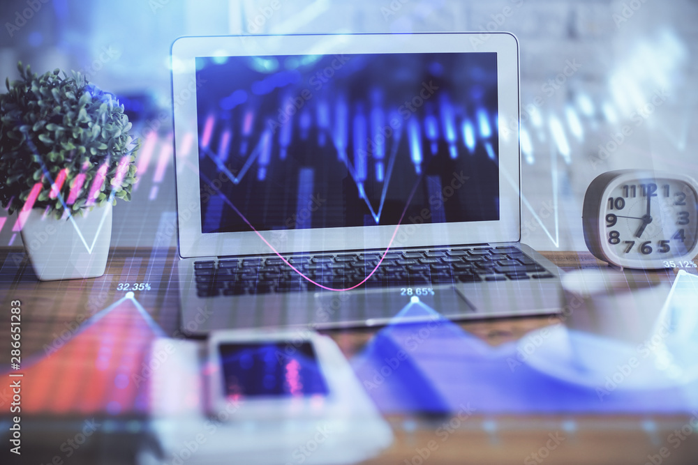 Poster stock market graph on background with desk and personal computer. multi exposure. concept of financi