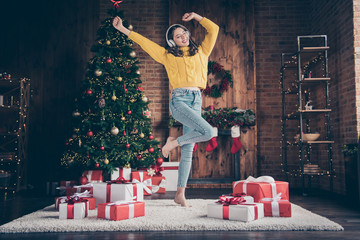 Full length body size photo of charming cute nice girl inspired with christmas music while dancing on carpet floor