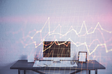 Financial chart drawing and table with computer on background. Multi exposure. Concept of...