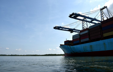 Cargo container ship during cargo operations in the port of Charleston, South Carolina. 
