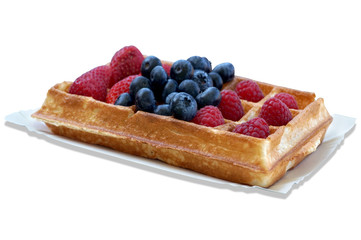 Waffle with fruits - strawberries, blueberries and raspberries