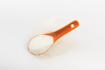 Spoon of fine granulated sugar isolated on white  - Image