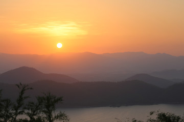 Fototapeta na wymiar Colorful sunset on top of mountain.