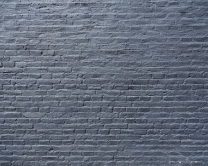 part of silver grey painted brick wall