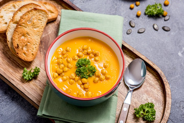 Pumpkin soup with baked chickpeas, healthy vegan eating, vegetable soup, autumn food