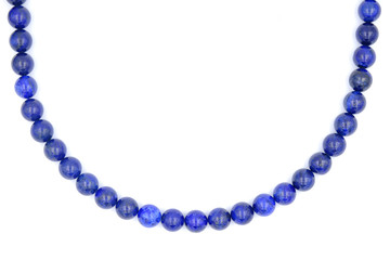 Single layer of blue lapis lazuli natural stone necklace isolated on white background